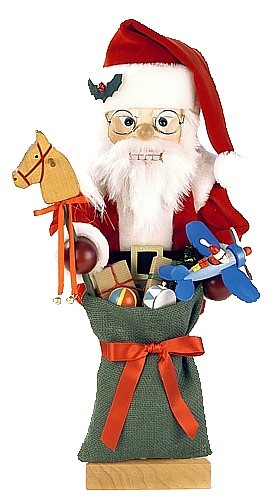 Nussknacker Weihnachtsmann mit Spielzeug Nussknacker Weihnachtsmann mit Spielzeug
