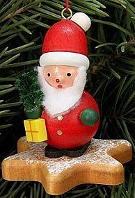 Christian Ulbricht Baumbehang Weihnachtsmann auf Lebkuchenstern Christian Ulbricht Baumbehang Weihnachtsmann auf Lebkuchenstern